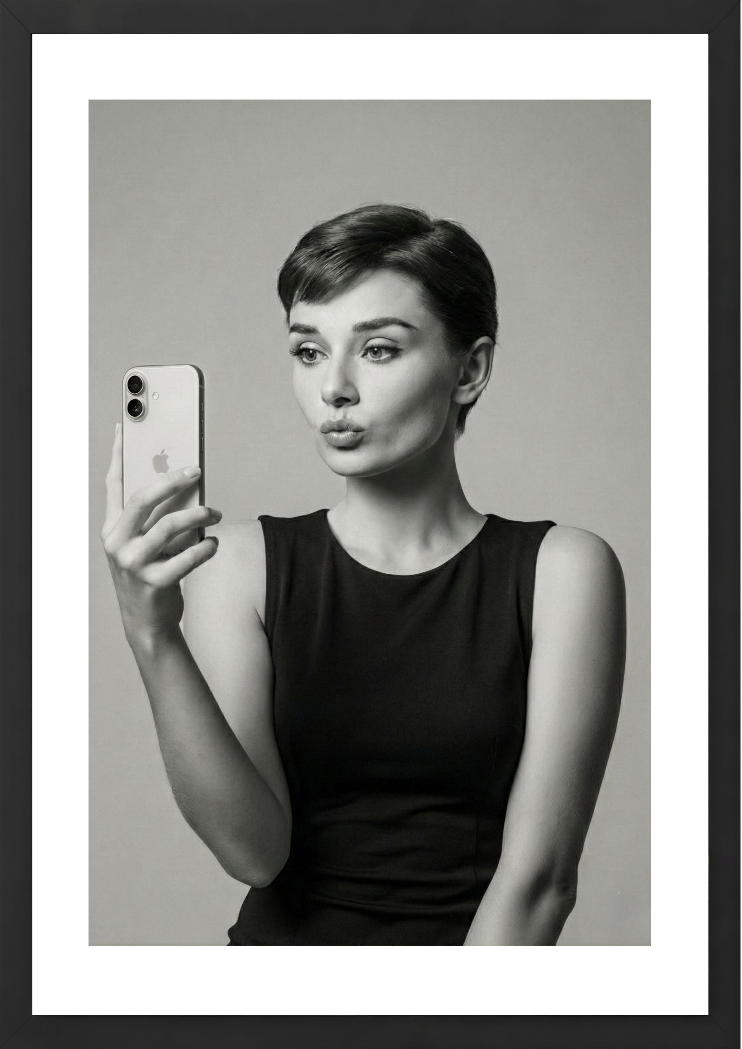 Audrey Hepburn black and white taking a selfie art print black frame